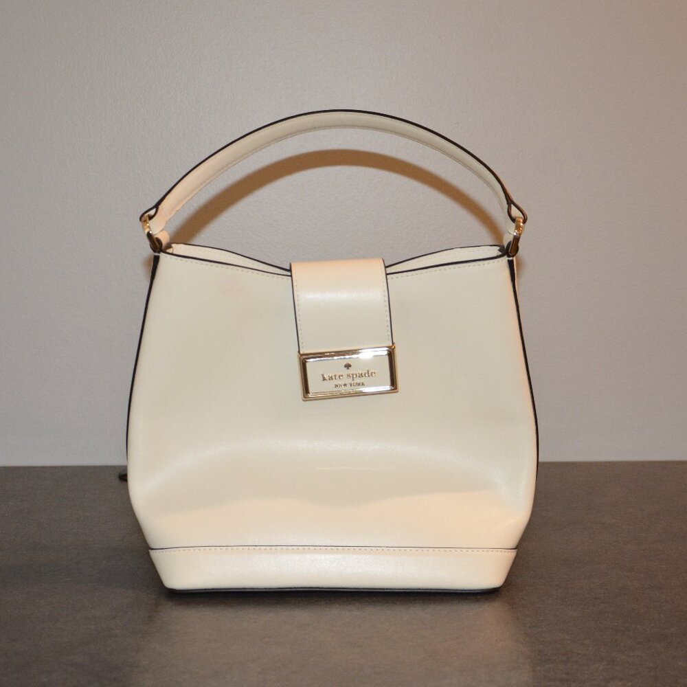 Kate Spade Reegan meringue (cream colored) smooth leather purse